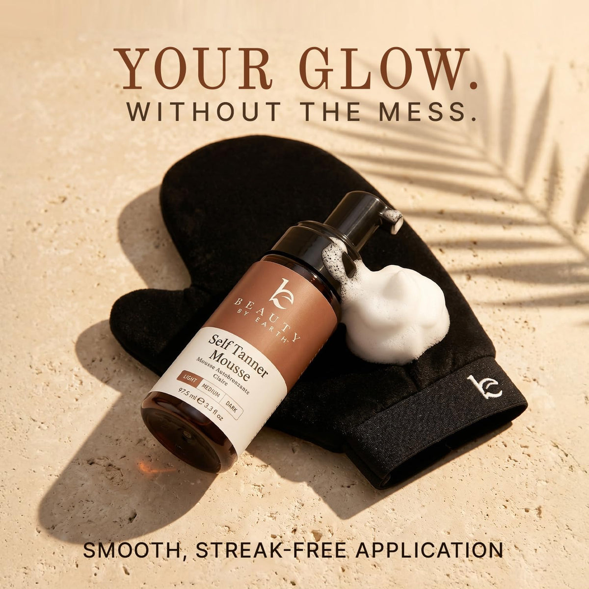 Beauty by Earth tanning mitt detail demonstrating smooth application
