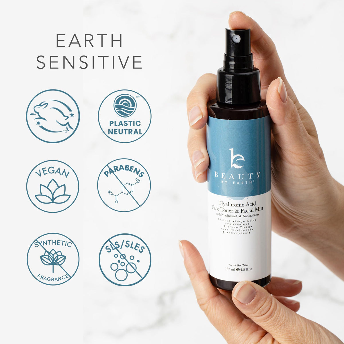 Beauty by Earth bottle next to ruler illustrating compact travel size