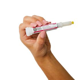 Beauty Secrets applying press-on nail with precise glue placement for neat results