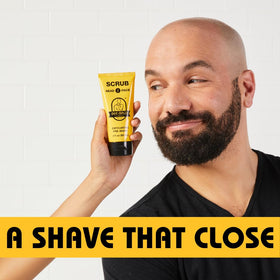 Bee Bald applied in shower showing active scrub use for better shave prep