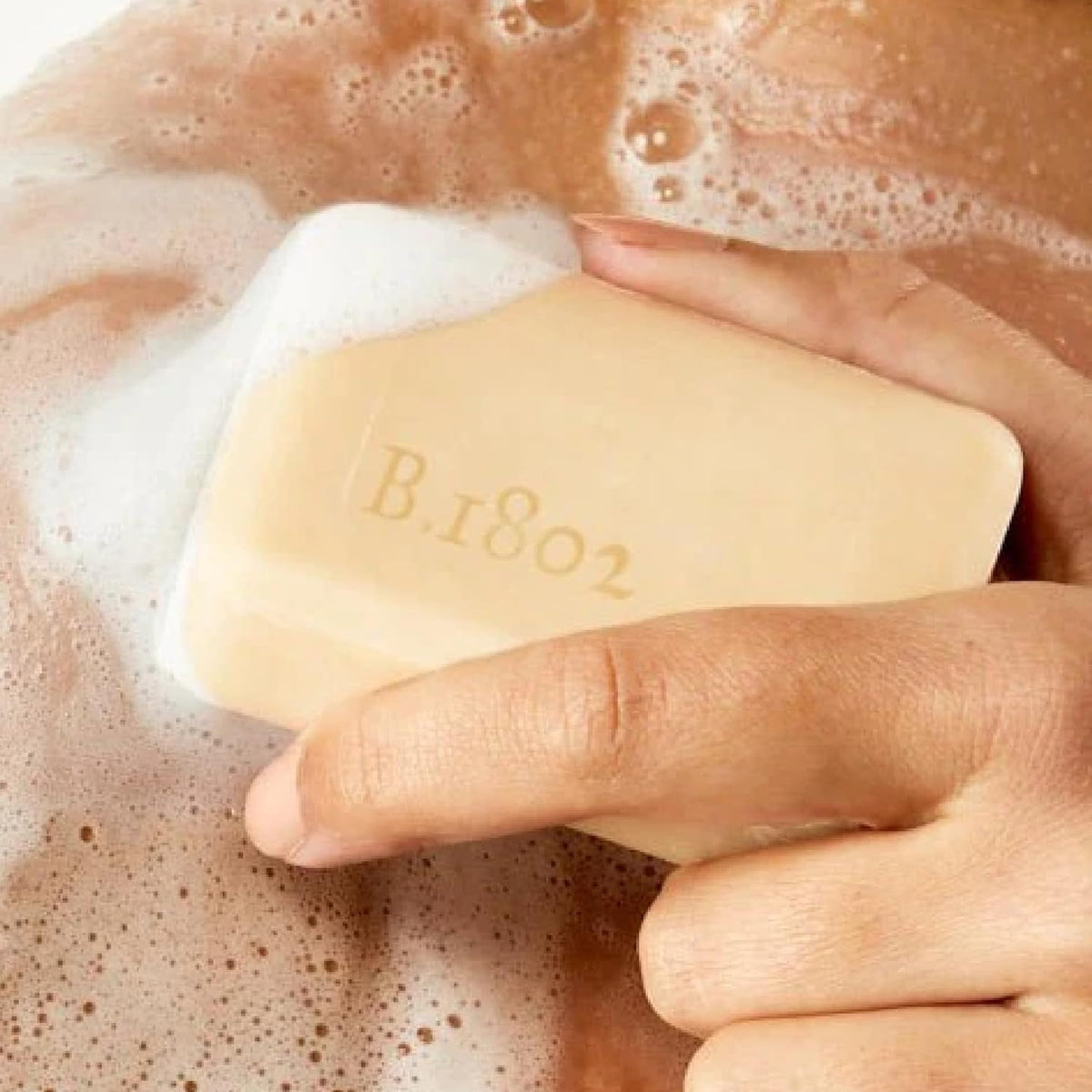 Beekman 1802 bars staged in bathroom emphasizing gentle daily use and style