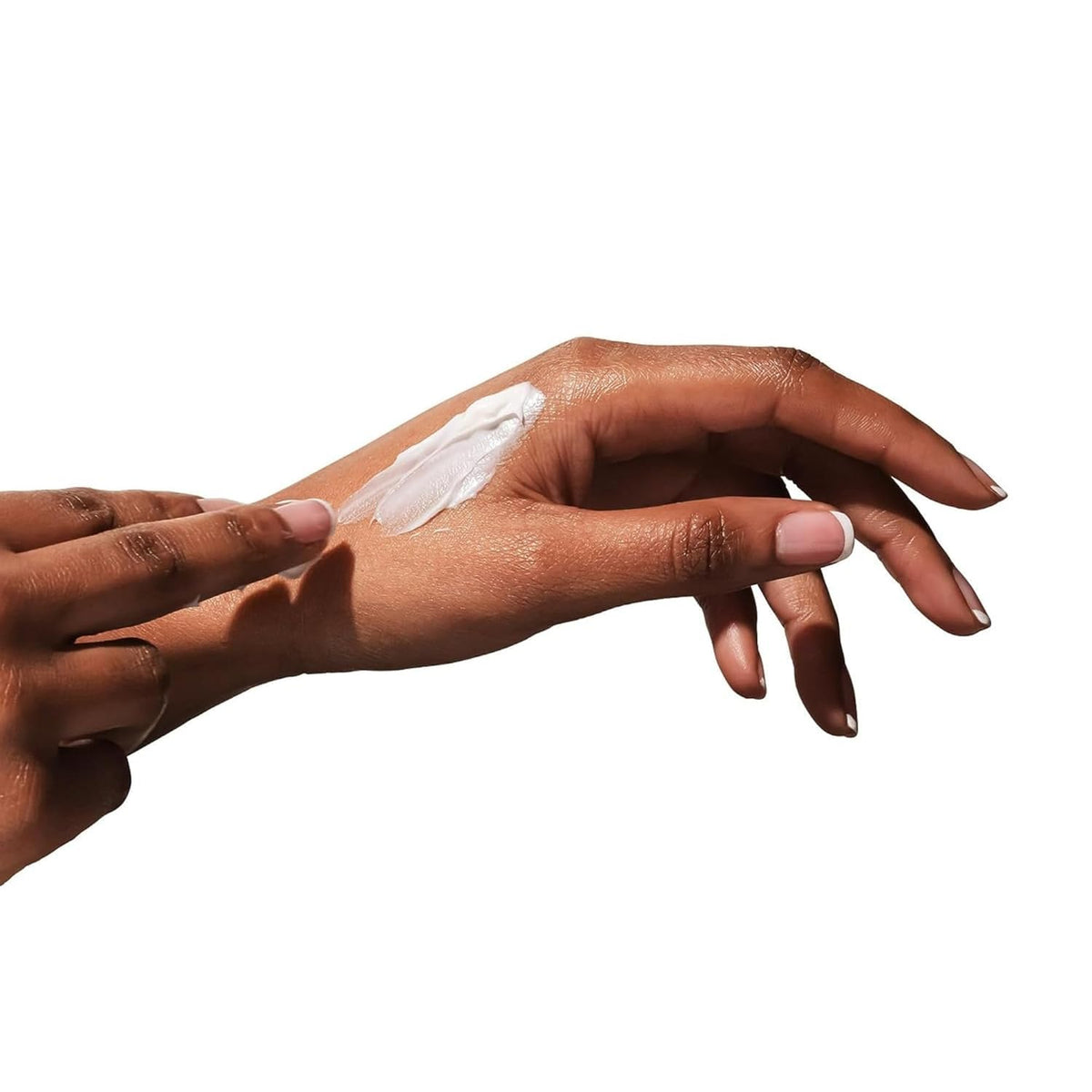 Beekman 1802 cream texture on hand demonstrating fast absorption and smooth finish