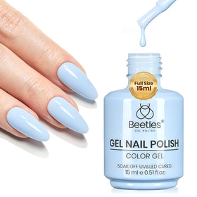 Beetles lifestyle shot of blue nails at a café, illustrating wearable seasonal style