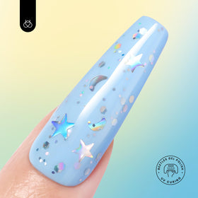 beetles brush stroke on nail swatch demonstrating even coverage and shine benefit