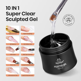 Beetles Gel Polish kit contents laid out with brush, cup and forms for professional convenience