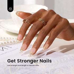 Beetles Gel Polish paper forms and double-ended brush displayed to show included accessories