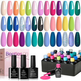 Beetles finished nails in beach setting emphasizing vibrant summer look