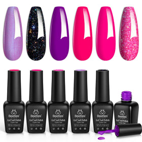 beetles lifestyle party manicure featuring finished hot-pink glitter nails