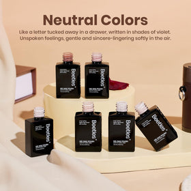 Beetles gel polish curing under LED lamp for durable manicure
