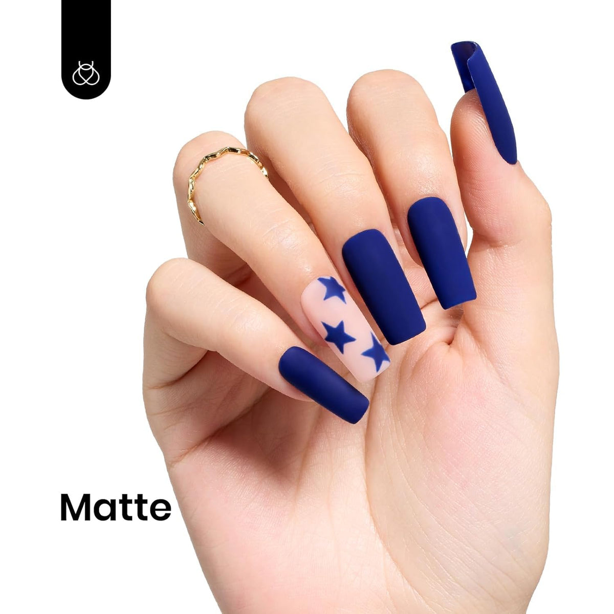beetles swatch on nails in salon lighting showing true dark blue color
