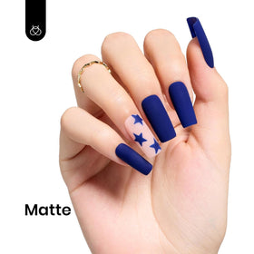 beetles swatch on nails in salon lighting showing true dark blue color