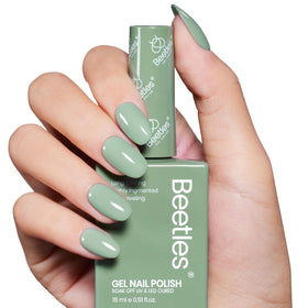 Beetles manicured hands outdoors showing Misty Sage wearable summer look