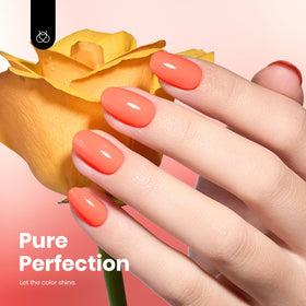 beetles nail on model in salon highlighting glossy coral orange finish