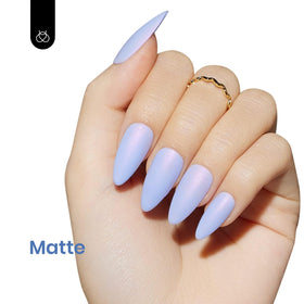 beetles periwinkle applied on fingertips in lifestyle setting — wearable elegance