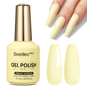 beetles bottle front view showing pastel yellow shade and professional labeling for visual reference