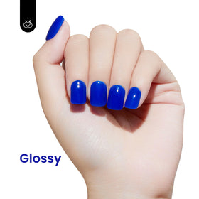 beetles sapphire love nail swatch on hand showing bold color benefit