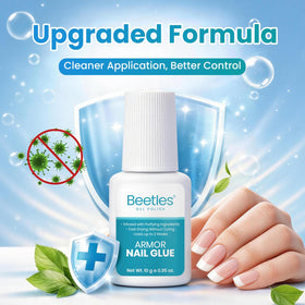 beetles scale comparison 10ml bottle next to coin showing travel-friendly portability benefit