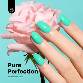 Beetles swatch on nail tip displaying the true mint-teal color