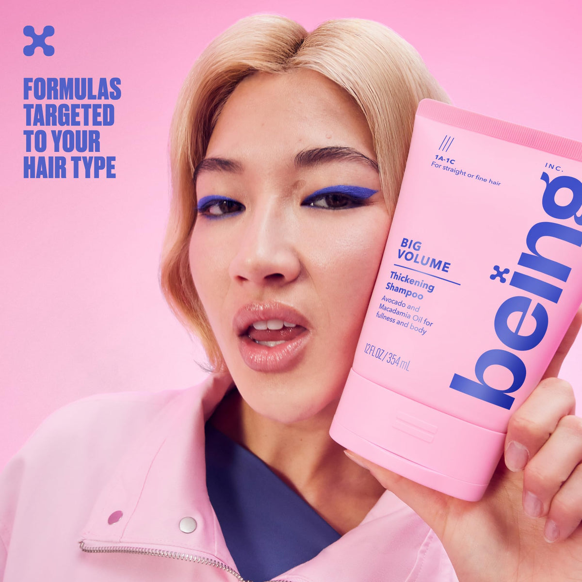BEING INC conditioner swirled texture showing lightweight creamy hydration