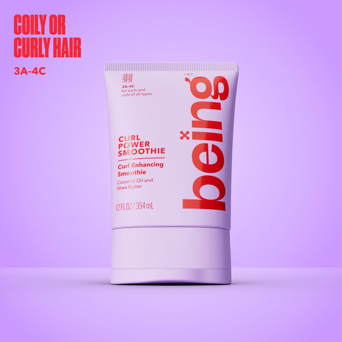 BEING INC applying cream to damp hair demonstrating easy absorption and definition