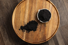 Belle Chemical charcoal mixed into soap batch demonstrating colorant use benefit