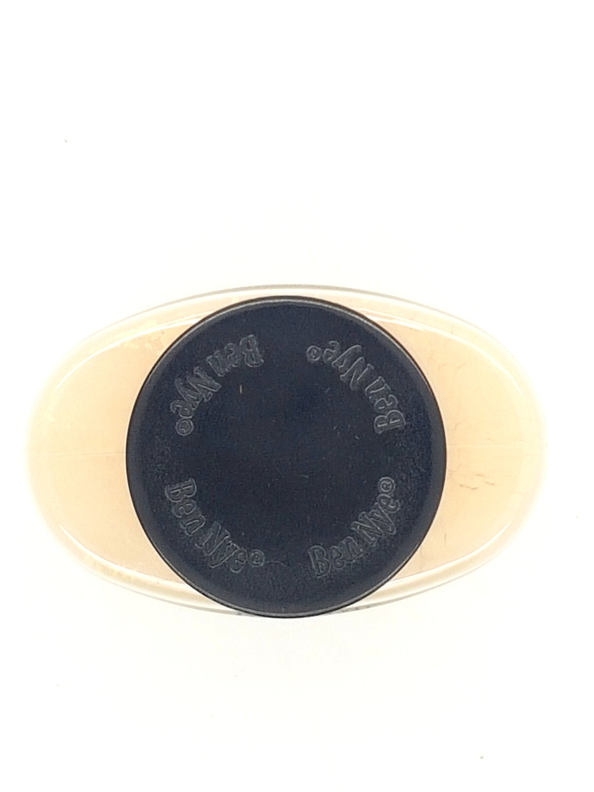Ben Nye banana powder texture closeup illustrating micro-milled silky finish benefit