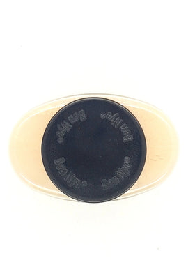 Ben Nye banana powder texture closeup illustrating micro-milled silky finish benefit