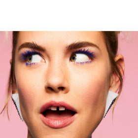 Benefit BADgal BANG applied on model's lashes for a dramatic blue eye look benefit
