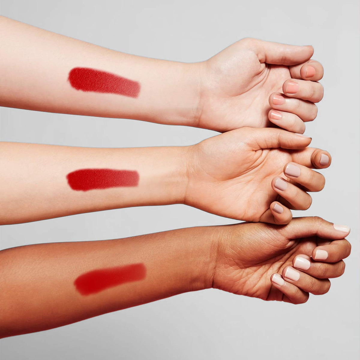 Benefit Benetint texture swatch on skin demonstrating sheer, blendable tint