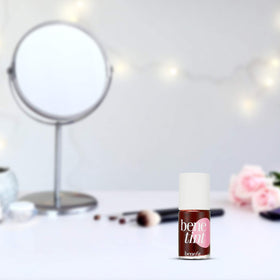 Benefit Benetint travel lifestyle shot in purse showing convenient on-the-go benefit