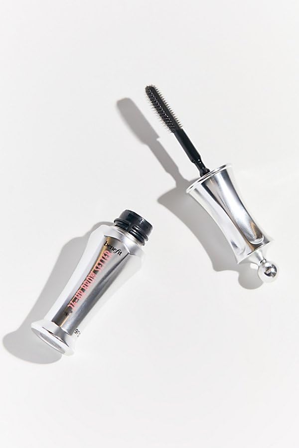 Benefit Brow Setter next to a coin for scale showing compact 0.11 fl oz travel size