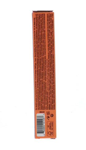 Benefit product in use applying brow wax with mirror for polished brows