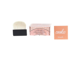 Benefit Cookie applied on cheekbones demonstrating natural soft-gold glow