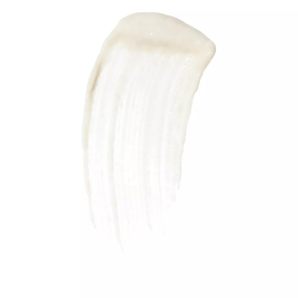 Benefit close-up of open tube texture revealing creamy, translucent wax for easy application
