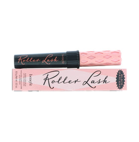 Benefit tube in hand for scale showing compact travel-friendly 0.30 oz benefit