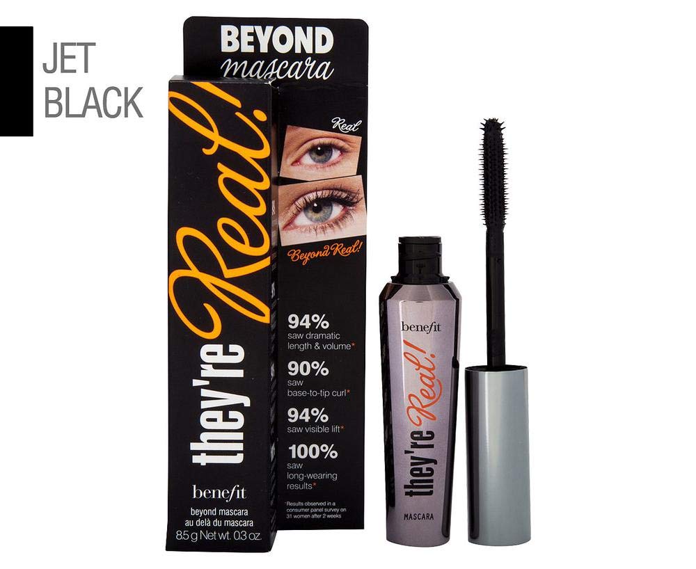 Benefit mascara in use by model applying to lashes for dramatic eye definition