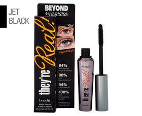 Benefit mascara in use by model applying to lashes for dramatic eye definition