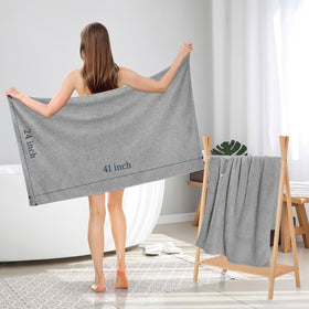 BEoffer towel in use wrapped on woman showing frizz reduction benefit