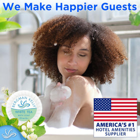 BERGMAN KELLY opened box revealing 100 mini soaps, efficient bulk supply for properties