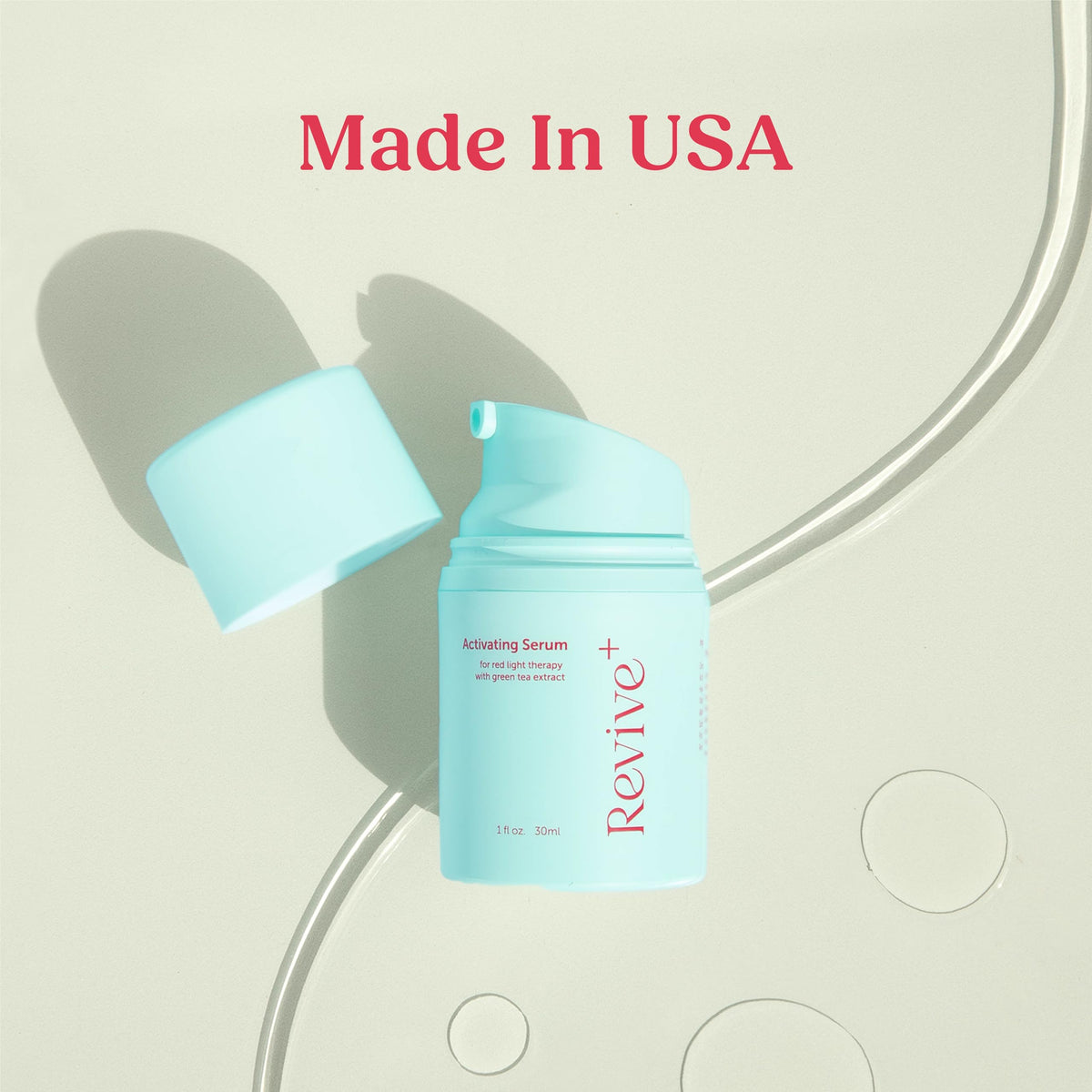 Berkland 1 oz bottle beside everyday items to show compact travel-friendly size