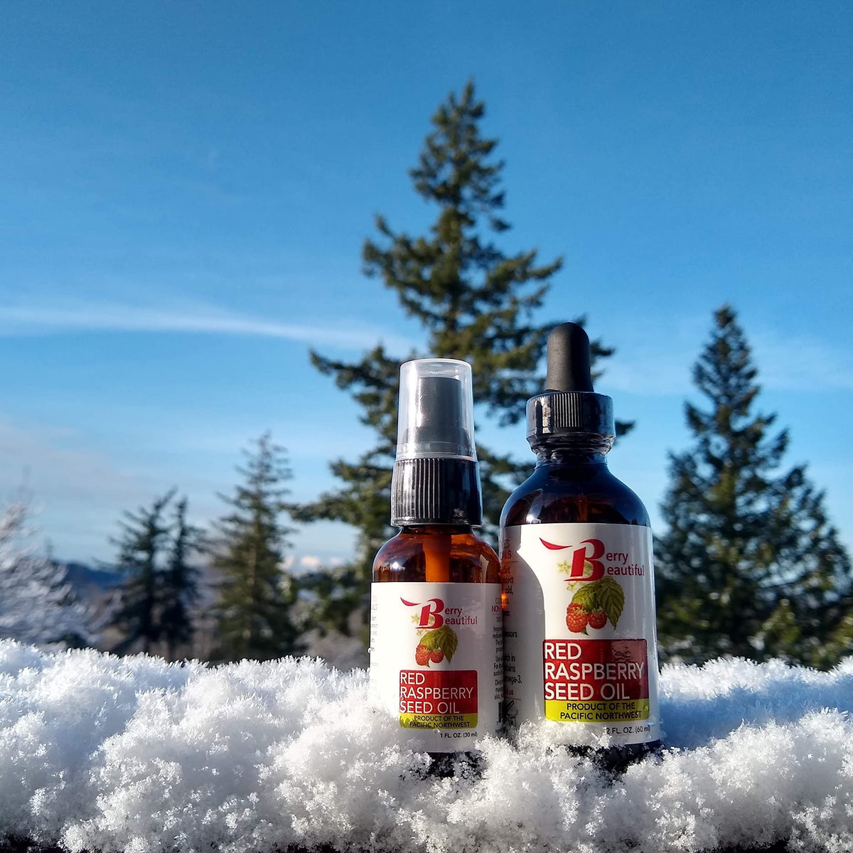 Berry Beautiful bottle in hand for scale illustrating convenient 2 fl oz size benefit