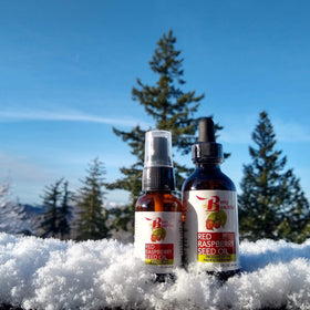 Berry Beautiful bottle in hand for scale illustrating convenient 2 fl oz size benefit