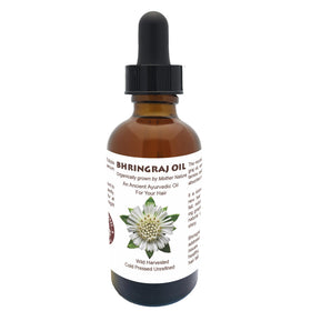 Best Nature's Bhringraj Oil on bathroom shelf among grooming items suggesting daily hair-care routine