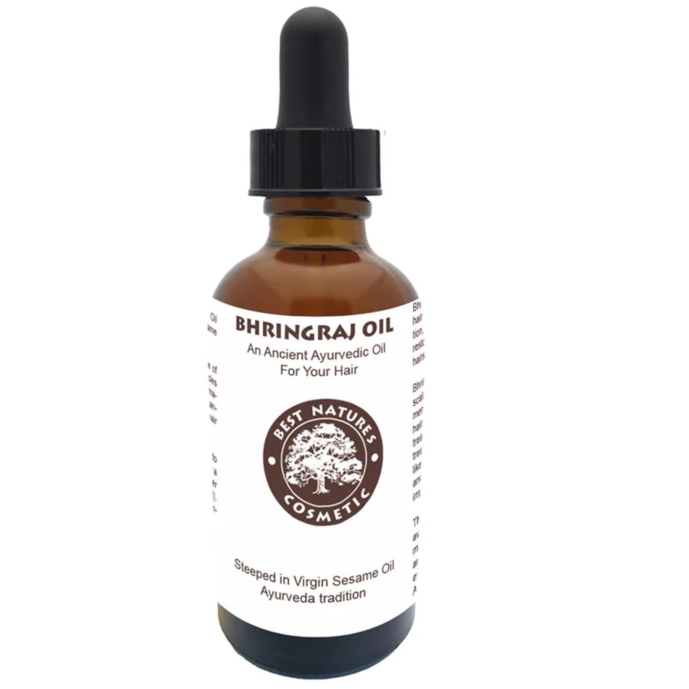 Best Nature's Bhringraj Oil next to a ruler showing 2 fl oz scale for travel-friendly size
