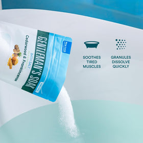 Better Bath Better Body pouch beside bar soap to show 32-ounce size