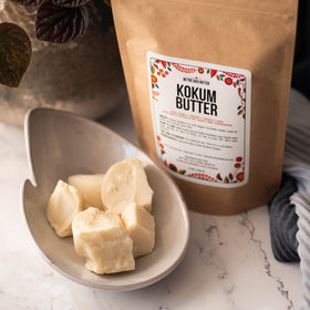 Better Shea Butter applying a pea-sized amount to hair ends for shine