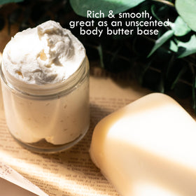 Better Shea Butter applying mango butter to curly hair, adds shine and manageability
