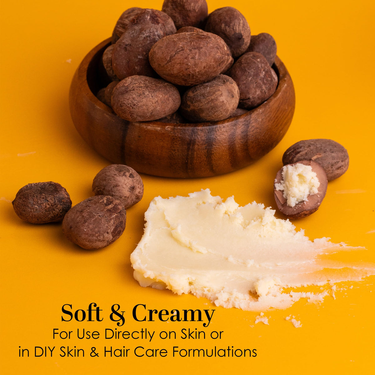 Better Shea Butter scooped on spoon ready to apply for deep moisture