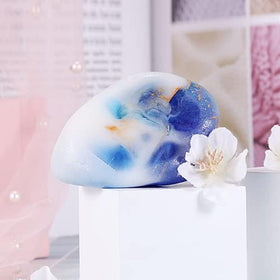 Bff Beauty Garden soap in a hand for size comparison and easy handling benefit