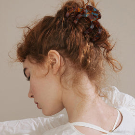 Bgffuy clip worn in an updo demonstrating secure styling for thick hair